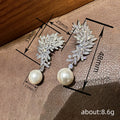 Crystal Leaf Cluster Pearl Drop Earrings in Silver Tone view 4