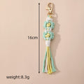 Gold Tone Woven Daisy Tassel Clip Keychains in Two Colorways view 4