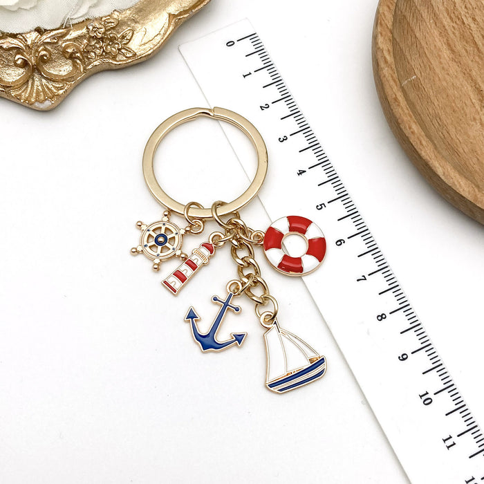 Red Blue Nautical Lighthouse Anchor and Sailboat Keychain Set