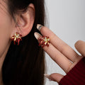Red Firework Burst Gold Tone Crystal Look Stud Earrings view 1