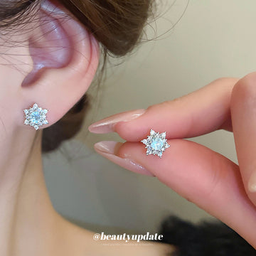 Silver Snowflake Stud Earrings with Blue Crystal Centers