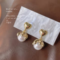 Gold-Tone Heart Stud Pearl Drop Earrings with Wave Frame view 4