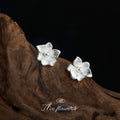 Silver Matte Flower Stud Earrings Pearl Center Pair view 1