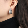 Ribbed Teardrop Stud Earrings Gold Steel Large Small Sizes view 3