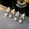 Silver and Pink Butterfly Pearl Look Dangle Stud Earrings view 1