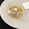 Gold Faceted