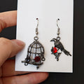 Asymmetrical Raven and Rose Birdcage Drop Earrings in Blackened Metal view 3