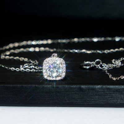 Product view showing a fine silver-tone chain with one cushion-shaped clear crystal pendant