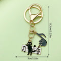 Piano and Music Note Charm Keychains Featuring Black Cat Across 33 Pictured Variations view 12