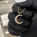 Gold Tone Crescent Moon Pendant Necklace with Clear Stones view 2