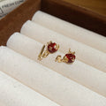 Gold Tone Star Stud Earrings with Red Brown Inlay Designs view 8