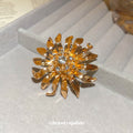 Gold Starburst Flower Brooch Clear Crystal Center Pin view 2