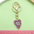 Heart Charm Keychains Featuring Purple Heart Across 18 Pictured Variations view 3