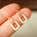 Open Square Crystal Drop Huggie Earrings in Gold Tone view 3