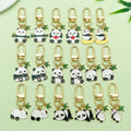 Panda Charm Keychains Featuring White Apple Across 54 Pictured Variations view 1