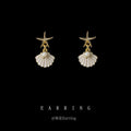 Gold Tone Starfish And Shell Fan Stud Earrings In White And Green view 1