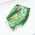 Green Enamel Leaf Brooch With Polished Metal And Sculpted Decorative Details view 2