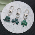 Four Green Clover and Hat Metal Keychain Design Set view 3