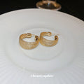 Wide Crystal Hoop Earrings in Gold and Silver Tone view 3