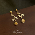 Gold Tone Rosebud Stem And Leaf Drop Stud Earrings For Women view 1