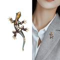 Branch Lizard Brooch in Metal with Textured Lizard Resting on a Slender Branch view 3