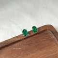 Silver Tone Emerald Green Oval Stone Clear Halo Stud Earrings view 4