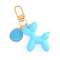 Gold Tone Balloon Dog and Smile Disc Clip Keychains view 5