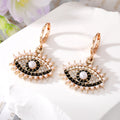 Gold and Silver Tone Crystal Pearl Evil Eye Huggie Earrings view 3