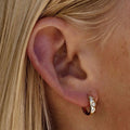 Gold Tone Star Set Clear Stone Huggie Hoop Earrings view 3
