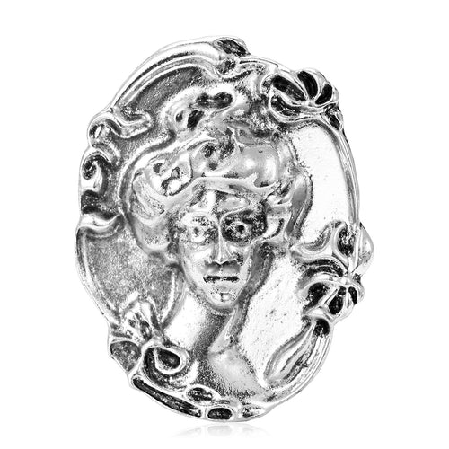 Angled view showing the embossed woman portrait brooch surface