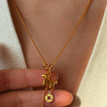 Gold Tone Horse Coin and Bell Tassel Pendant Necklace view 3