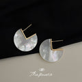 White Pearlescent Disc Stud Earrings With Gold Tone Square Cutout view 4