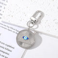 Gold and Silver Tone Geometric Hamsa and Eye Clip Keychains view 3