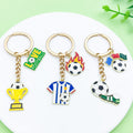 Soccer Charm Keychains Featuring Yellow Soccer Across 21 Pictured Variations view 1