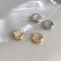 Rounded Geometric Huggie Hoop Earrings In Gold And Silver Tone view 3