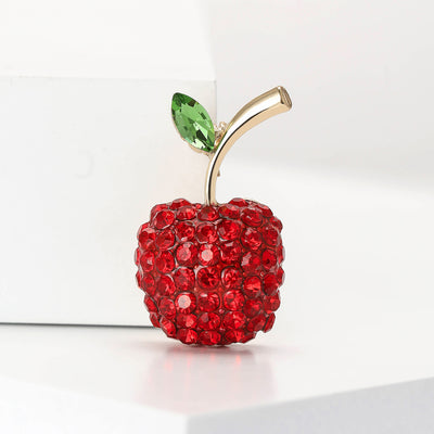 Bright Red Crystal Apple Brooch with Curved Stem and Green Leaf grouped product view