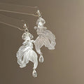 Textured Leaf Drop Earrings In Gold And Silver With Decorative Details view 7