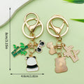 Panda Charm Keychains Featuring White Apple Across 45 Pictured Variations view 9