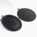 Oval Pendant Bezel Trays with Decorative Borders in Three Finishes view 4