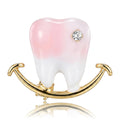 Pink Enamel Tooth Brooch with Crystal Accent and Gold Smile view 1