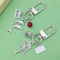 Dolphin and Turtle Charm Keychains Featuring Chain Across 7 Pictured Variations view 4