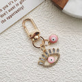 Gold Tone Rhinestone Lash Evil Eye Clip Charms in Five Colors view 8
