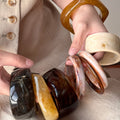 Four Brown Or Cream Irregular Wide Marbled Resin Bangle Designs view 1