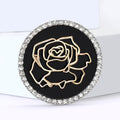 Round Rose Brooch In Metal With A Black Enamel Field, Gold-Tone Rose Outline, And Crystal view 2
