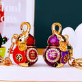 Enamel Mouse and Fortune Gourd Keychains with Braided Fortune Loops view 1