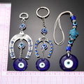 Silver Tone Horseshoe and Fish Blue Evil Eye Keychains in Three Designs view 5