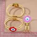 Gold Tone Round Glass Evil Eye Hinged Cuff Bracelets in Eight Colors view 4