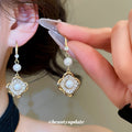 Gold Tone Flower And Pearl Earrings In Three Styles view 4