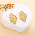 Thirty Gold Tone Sculptural Leaf Heart Shell and Geometric Earrings view 12