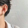 Gold Triple Band Smooth Mini Huggie Stud Earrings Pair view 2